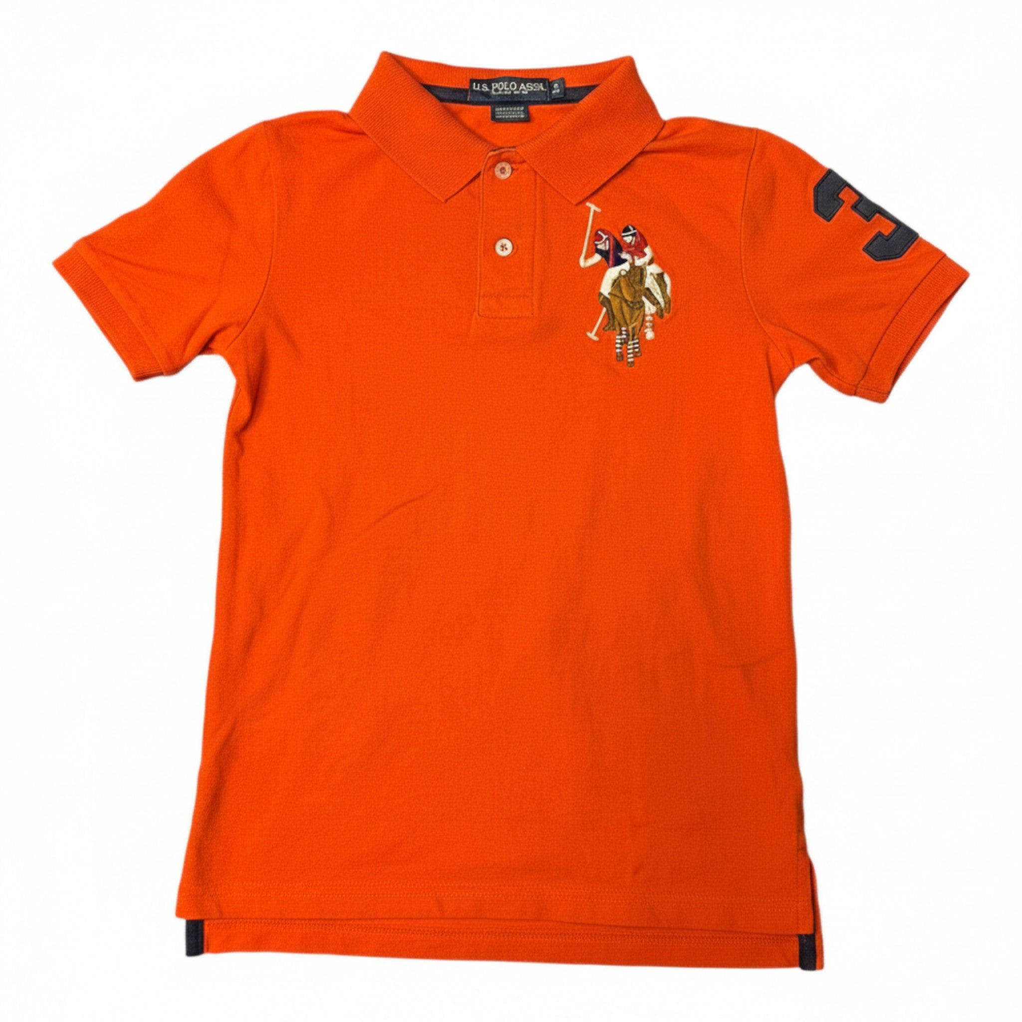 Polera U.S. Polo Assn. Naranjo 8 años seleccionada por NÜVA